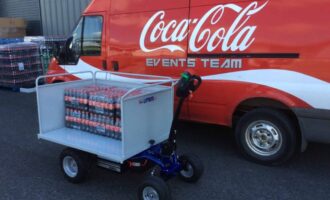Electric platform truck transporting drinks at an event